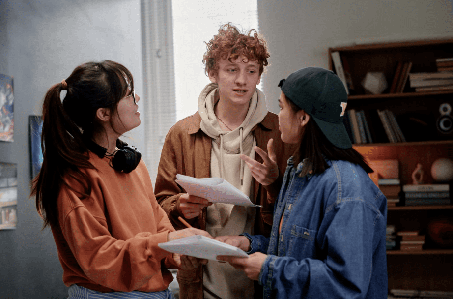 Three teenagers chatting